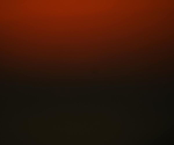 Abstract sunset colors over a dark background